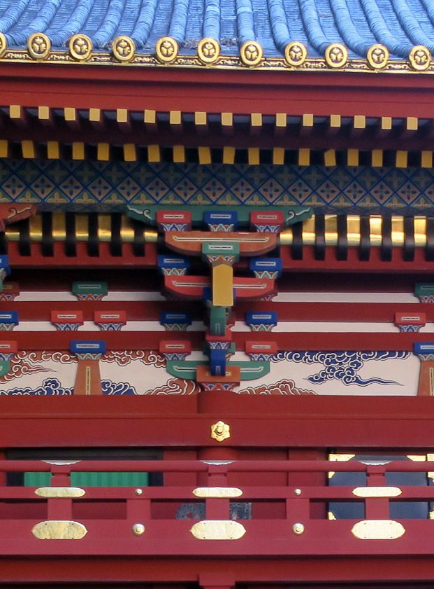 A blowup of the decoration, which looks clean, unweathered, and very colorful. Different from Chinese decoraton, somehow.