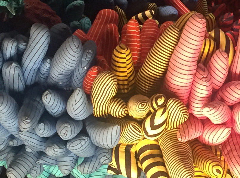 The shapes appear to be patterned fabric sewed into tubes that were stuffed.