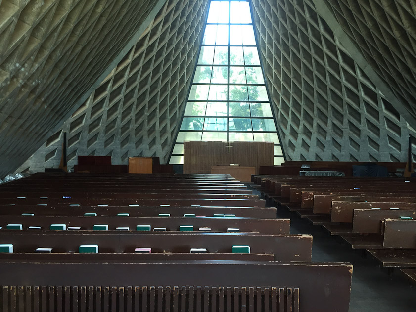 The interior, showing the concrete lattice of beams forming the walls.