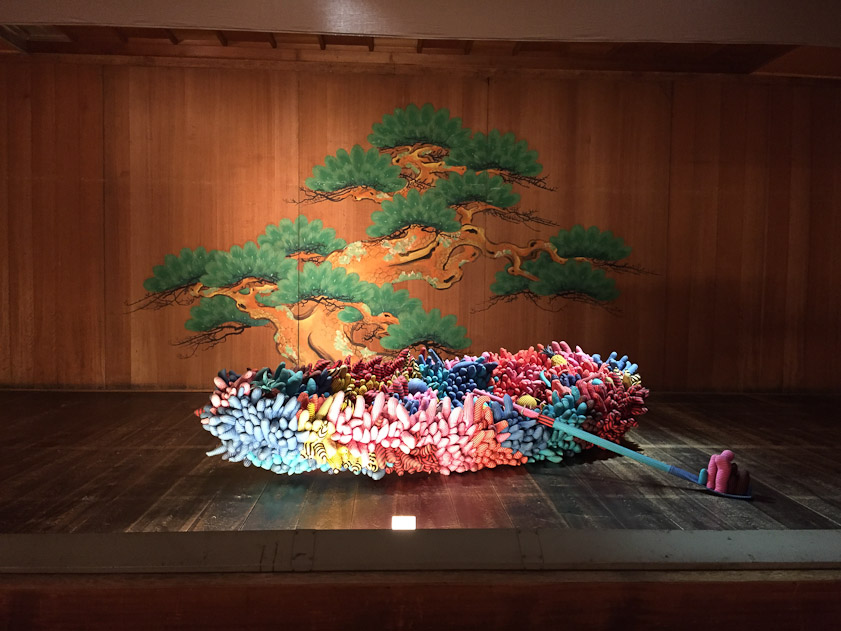 Kusama made some sort of a boat from soft shapes line the villi inside a digestive tract or like a coral reef. It was exhibited on a Noh stage.