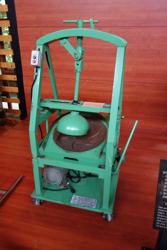Some tea such as oolong is rolled into balls on a machine like this. We saw old prints at the history museum of this being done by people using their feet.