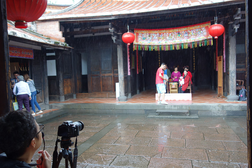 The main house has an inner court where families were being photographed.