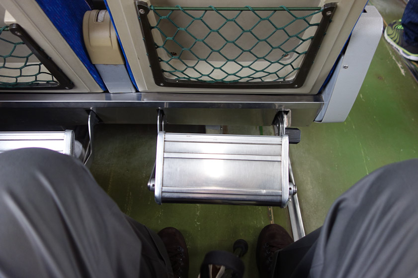 We ran across these uncomfortable foot rests a couple of times in Taiwan. They couldn't be put out of the way to allow me put my feet under the seat in front of me so my knees would be more comfortably flat.