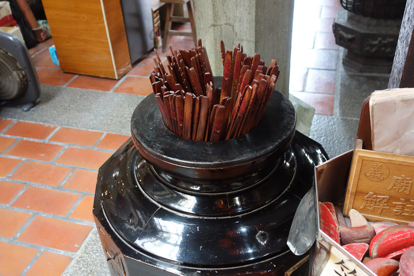 Divining sticks. I never saw these in use. Bones were the preferred apparatus.
