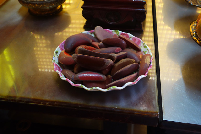 Petitions to the Matchmaking god are tested by throwing divination bones.