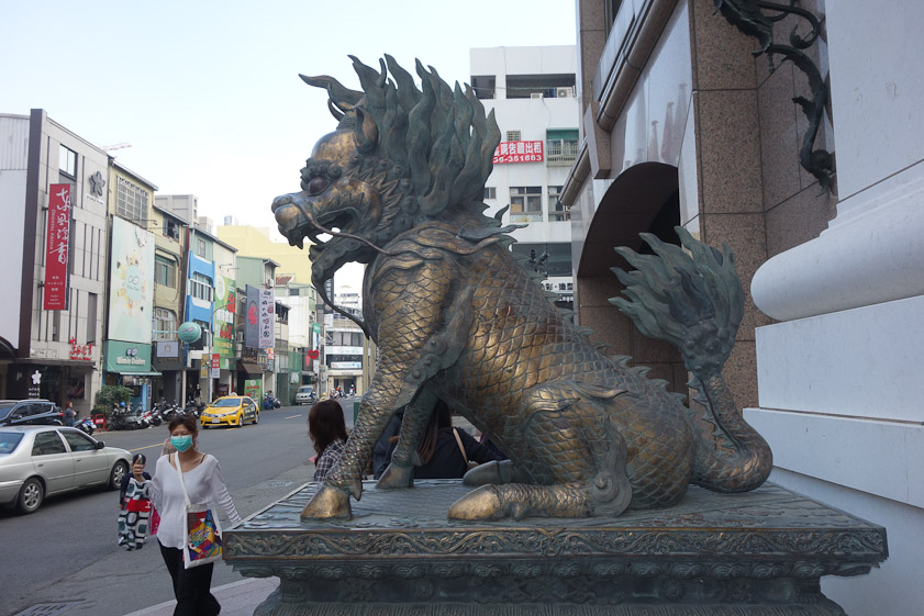 Our hotel, the Grand Hi-Lai, had a set of wonderful guardian dragons, this one with hooves and scales.