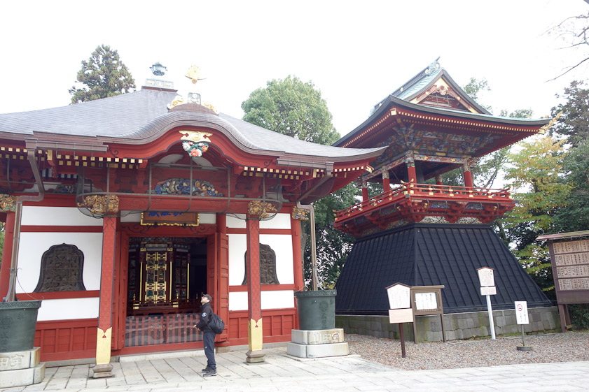 Issaikyo-do and a bell tower are to the right of the 3-story pagoda.