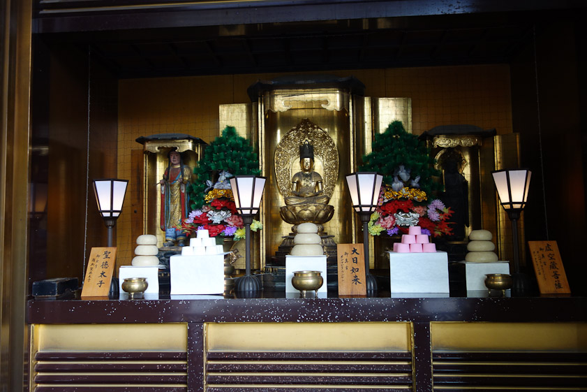 I was struck with how different this Japanese Buddhist shrine looked than a Taiwanese Taoist shrine. The food offerings are neatly stacked. It is neat, clean, orderly.