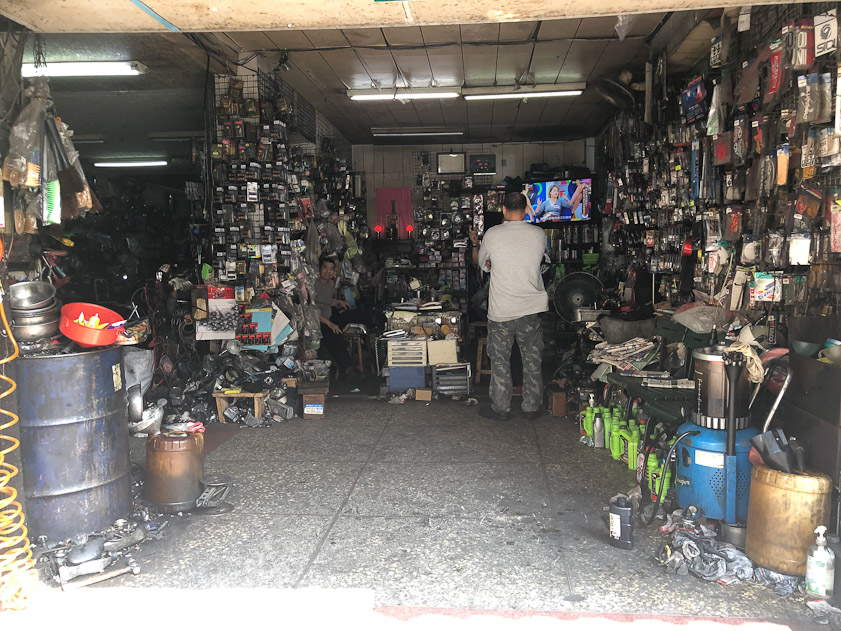 Another sidewalk garage in my collection. This one was slightly larger, filling the space of two storefront shops.