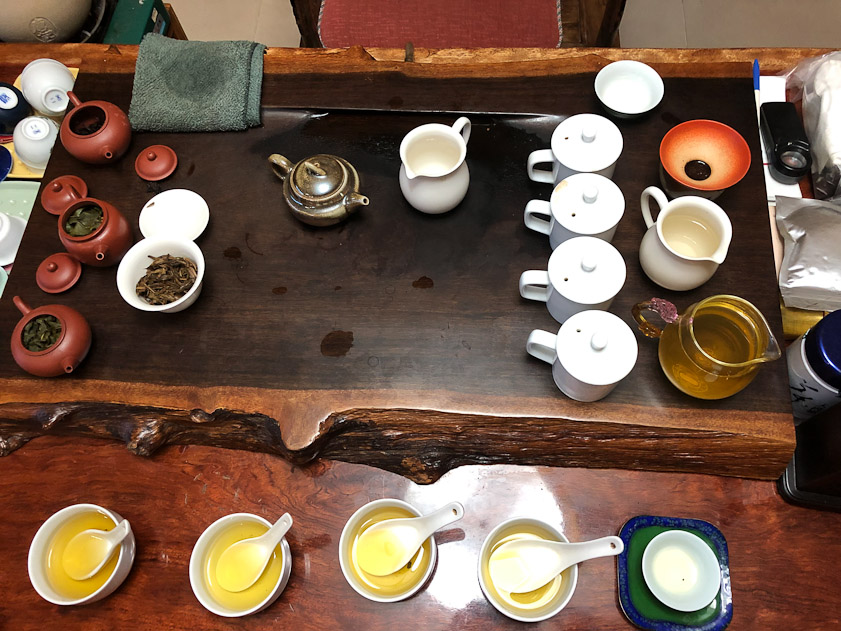 Tea was ladled from the dishes into our cups for tasting. The clay tea pots on the left had been used to brew the teas we'd tasted earlier.