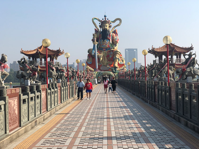 The next temple to the south extends into Lotus Pond and features an immense statue of the Bei-Ji Shien-Tien Emperor.