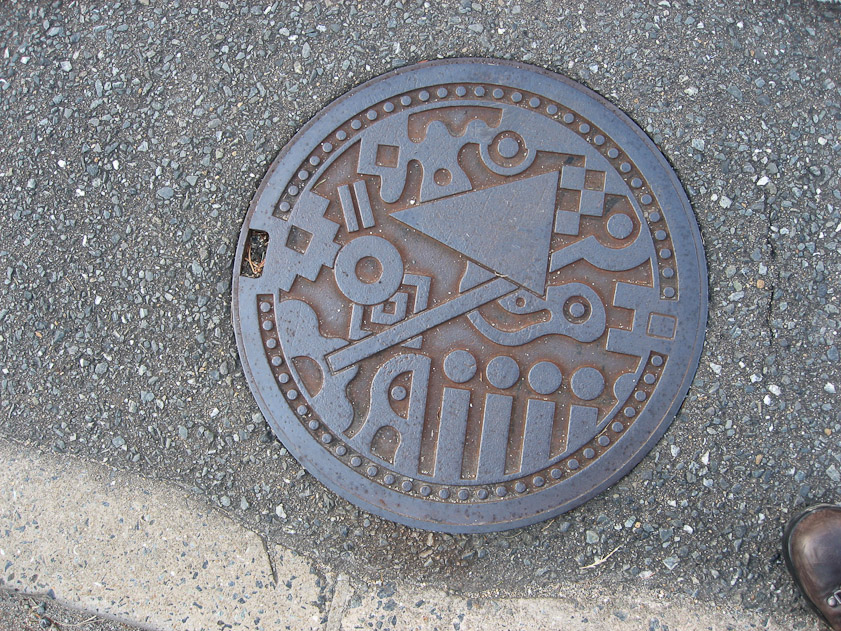Modernist manhole cover in Fukuoka.