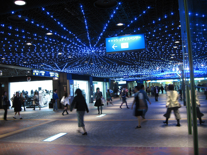 An underground mall. The lights move, like the underground passage at the National Gallery in Washington.