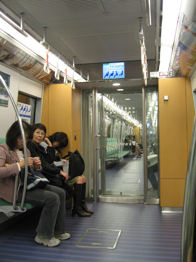Inside a Fukuoka subway car.