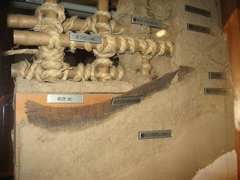The Dutch operated out of an island in Hagasak harbor called Dejima. It is now a museum, and this explains how a wall was constructed