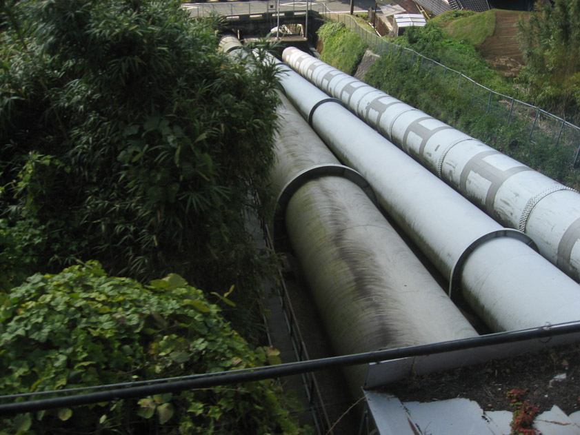 Penstocks carrying water down to a hydroelectric plant.