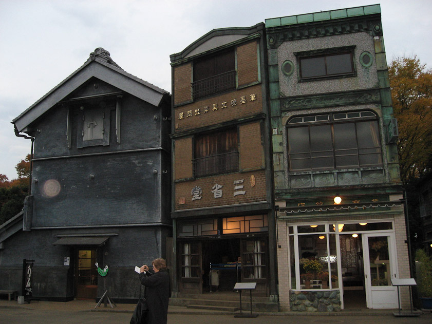 The building on the left is an old style fireproof warehouse to protect valuable stock or possessons of a merchant.