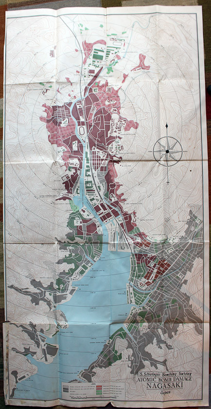 A map from the US Strategic Bombing Survey showing bomb damage in red and green and geographic features in black and white.