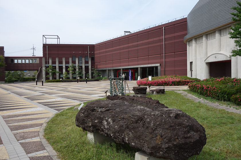 We came across the Wakou Museum when we looked at a map of Yasugi while waiting ar the Yasugi train station for the bus to the Adachi Museum. It describes the tatara process for making steel, an old batch process used for centuries in Japan to make sword steel. The black lump is the steel left in the bottom of a tatara furnace after firing.