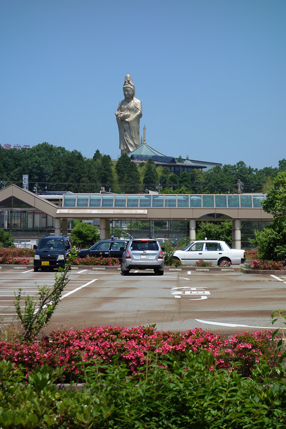 On an excursion June 3 we saw this statue looming over Kagaonsen Station, seen from the Kaga Art Museum.