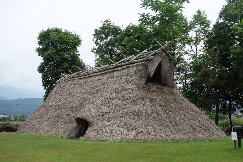Next to the Ippuku Museum is the archeological site of several houses from the Jomon Period (13,000 to 300 BC). This is a reconstruction of the largest house. The site is called the Fudodo Iseki Site. Note the opening at the end to let smoke out while not admitting rain.