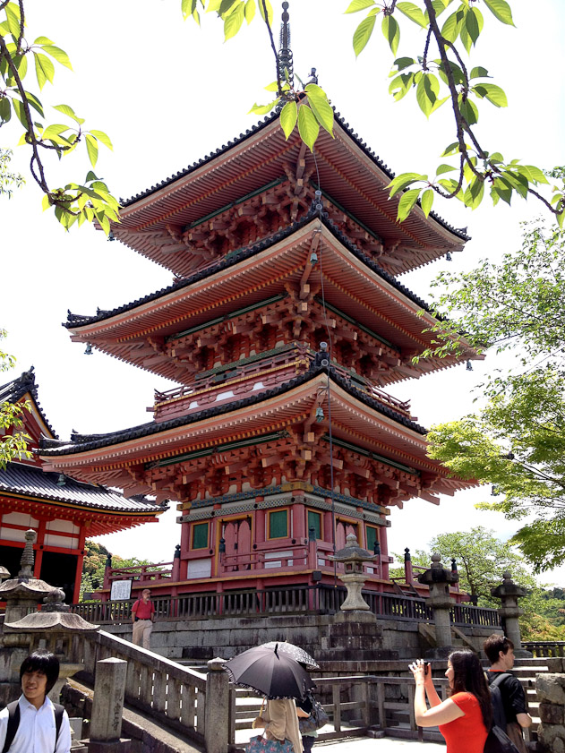 The pagoda at Kiyomizu-dera, a temple at the end of a long, steep road, crowded with tourists and tourist shops.