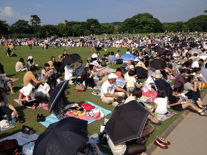 There was a large crowd at the castle to see a parade of Walt Disney characters.