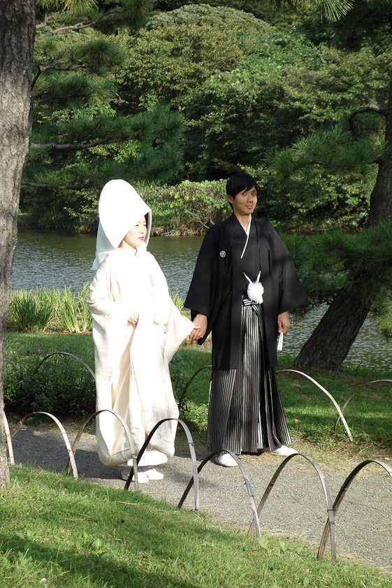 Japanese gardens are littered with bridal couples being photographed.
