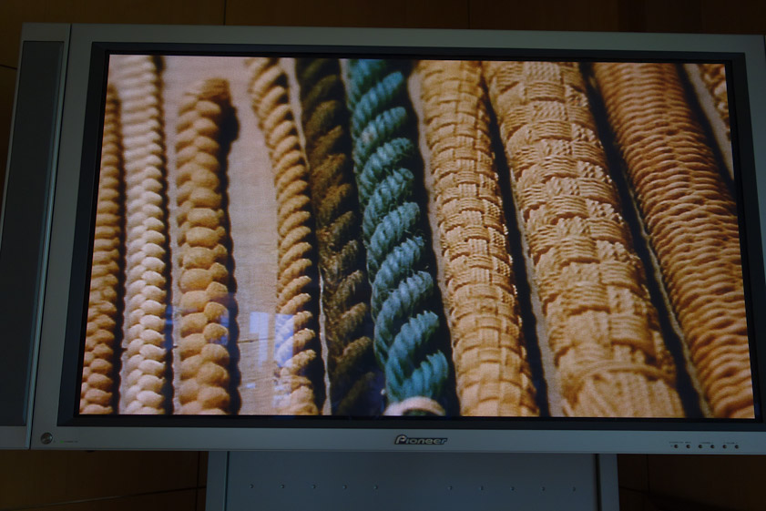 This still from a video at the Museum shows some of the rope tools used to impress patterns into works such as Kamoda and Okabe made.