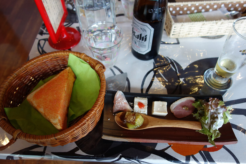 The lunch for sale at this little museum in the country in Japan put to shame anything available in the capital of the United States. That's tomato toast in the basket, and sashimi on the platter.