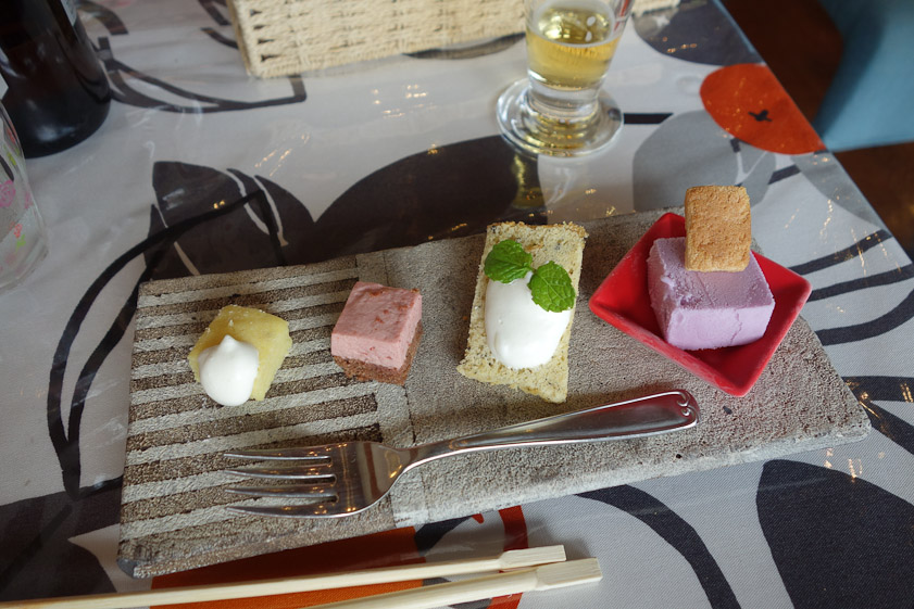 Dessert was beautiful and tasted good, too. Note the serving platter of stone.