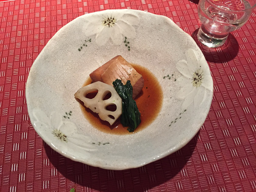 Boiled fish with lotus root and a little spinach.