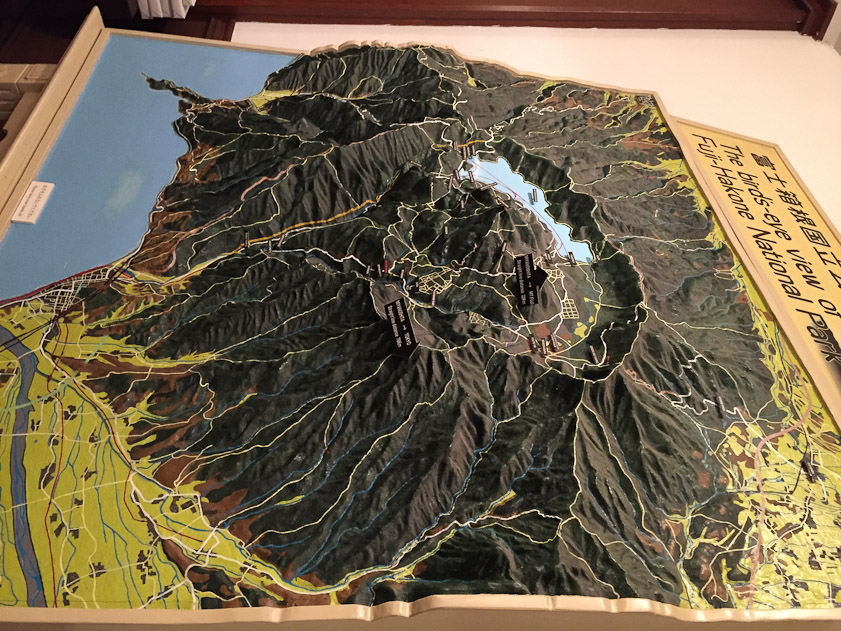 This relief model of the Hakone area in our hotel lobby shows that it is a former volcano, with a large caldera containing Lake Asti and several smaller, younder volcanic cones. Our hotel is on the left of the caldera. A traction railroad runs up from sea level to Gora in the caldera via 3 switchbacks.