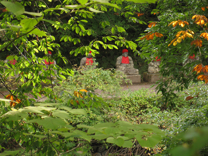 These statues with red bibs and caps are like others we saw elsewhere in Japan.