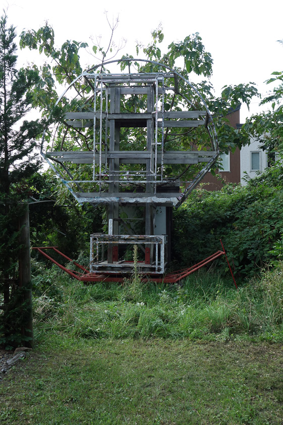 This mysterious structure behind the Umeda house was later revealed to be the frame around which a festival float was built.
