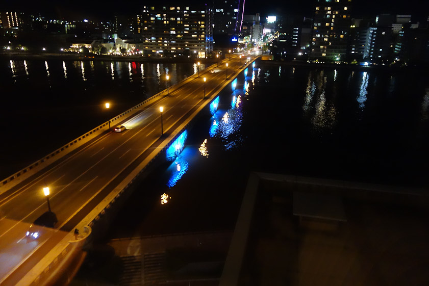 At night the Bandai Bridge is lilluminated by changing colors.