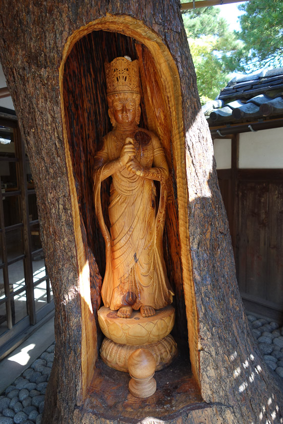 This statue of Buddha Mahavairocana was carved out of the heart of a dead red pine. It is on the Ito Estate southeast of Niigata.