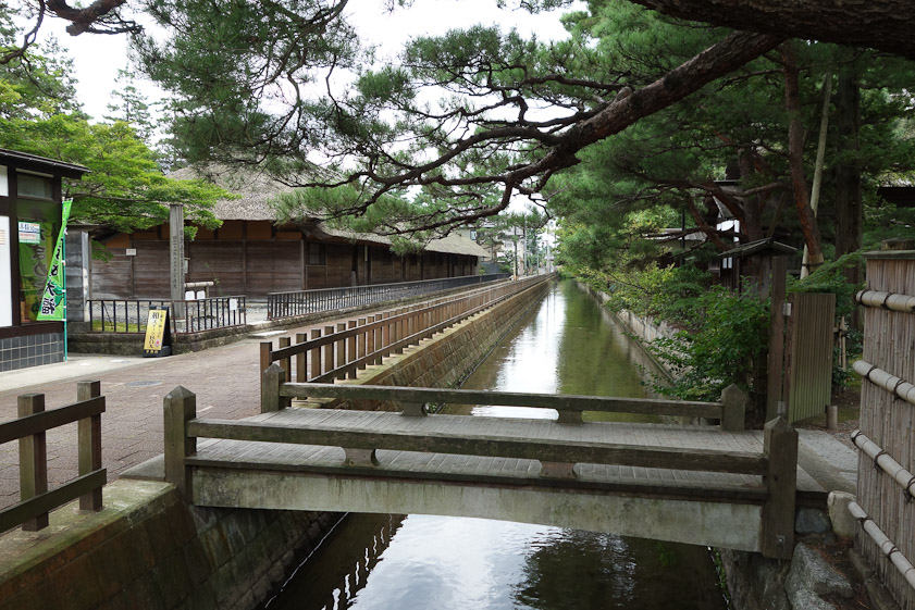 Moat at Shibata Castle. The building on the right is an Edo-period barracks for guards.
