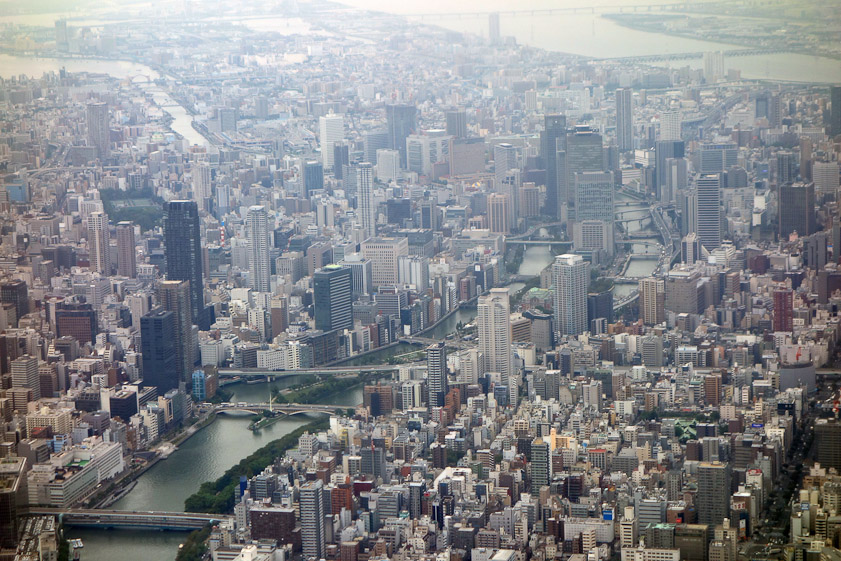 Osaka central business disrict. Nakanoshima is a long, narrow island in the Kyū-Yodo River which flows into  Osaka Bay.