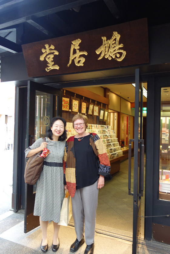 Successful shopppers outside a special stationery store.