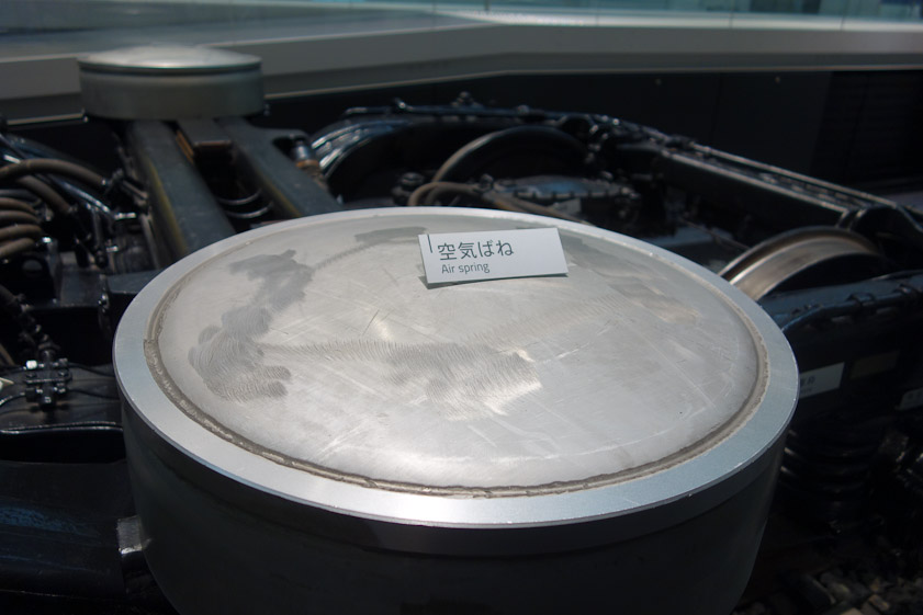 The car is separated from the bogie by cylindrical air springs.