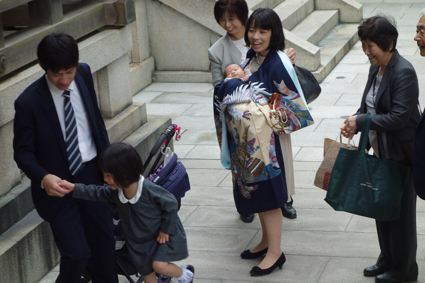 She brought her baby for presentation at the Meiji Shrine, a family event, for a ceremonial blessing.