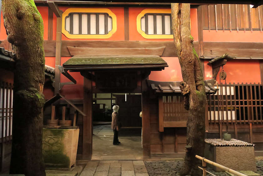 The kitchen entrance to Sumiya. The guest entrance was to the right, blocked by the little bamboo barrier.