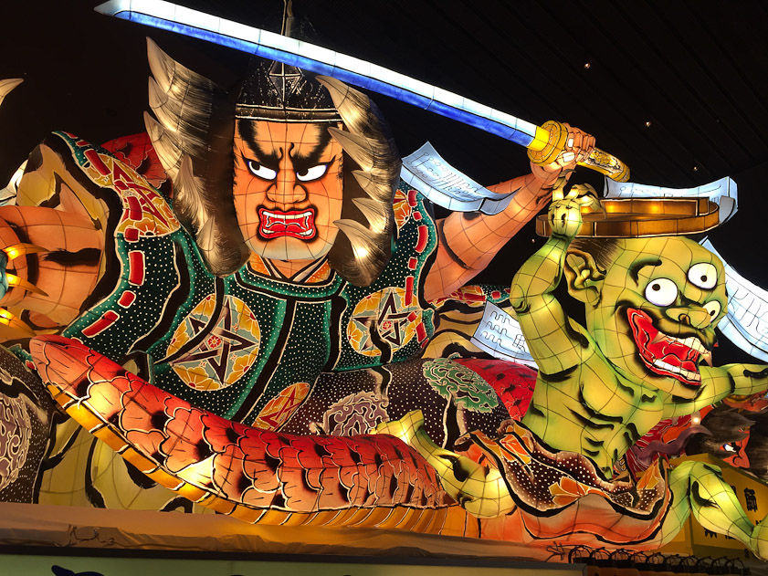 Another float where a hero fights a demon.