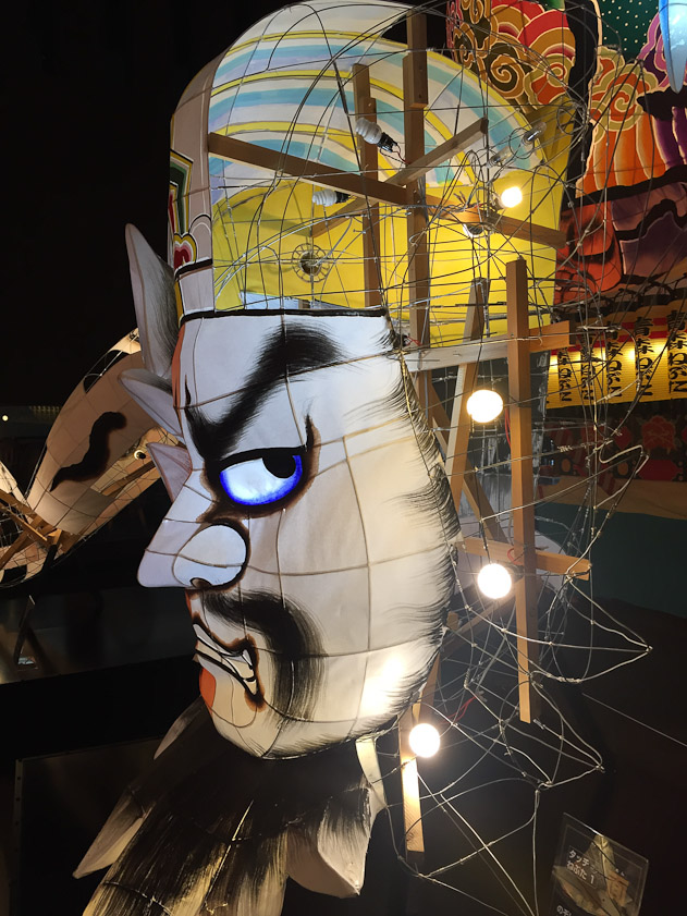 Paper is attached to the wire and then painted.