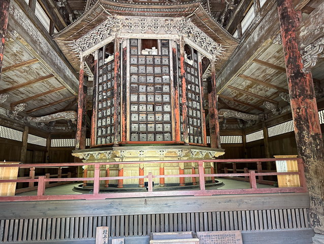 The scriptures are scrolls stored in this roatating rack.