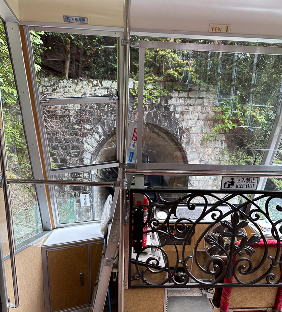 We sat at the rear of the car with this view of a tunnel we'd just left.