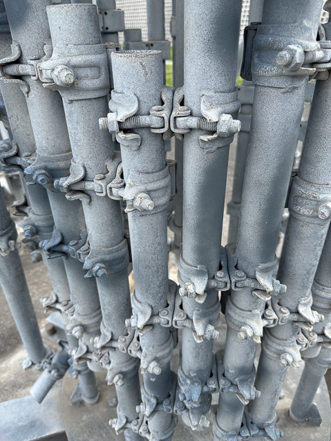 The sculptor used scaffolding hardware.