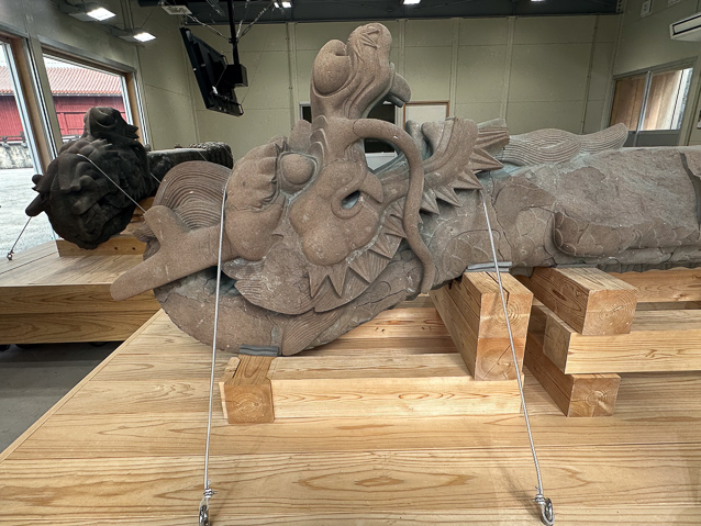 Two dragon columns flanked the stairs leading to the entrance to the Seiden.  They survived the fire, barely, and needed cracks to be repaored.