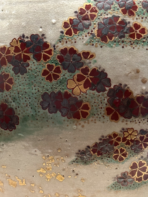 The potter was an innovator in use of colored enamels layed down in successively lower firings.